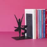 Black Metal Yoga Silhouette Bookend with books