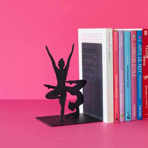 Black Metal Yoga Silhouette Bookend with books