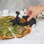 novelty scooter cutting pizza