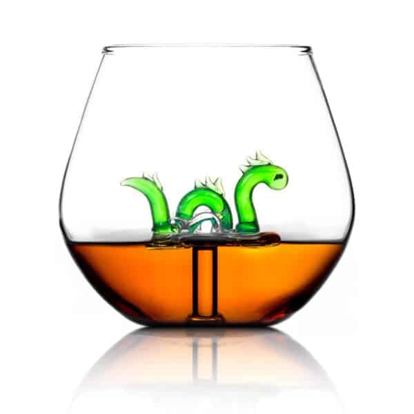 Stemless glass tumbler with a Nessie figure at the centre, perfect for cocktails or wine.