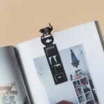fishing cat silhouette bookmark – bookshelf & goldfish bowl (black plastic)