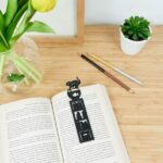 fishing cat silhouette bookmark – bookshelf & goldfish bowl (black plastic)